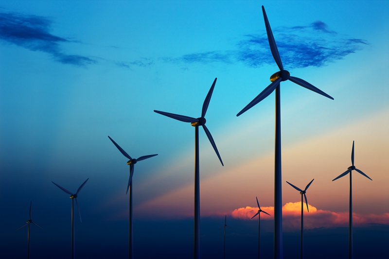 覓知網_夕陽下的風力發電機風電在日落的農場_1627498_副本.jpg